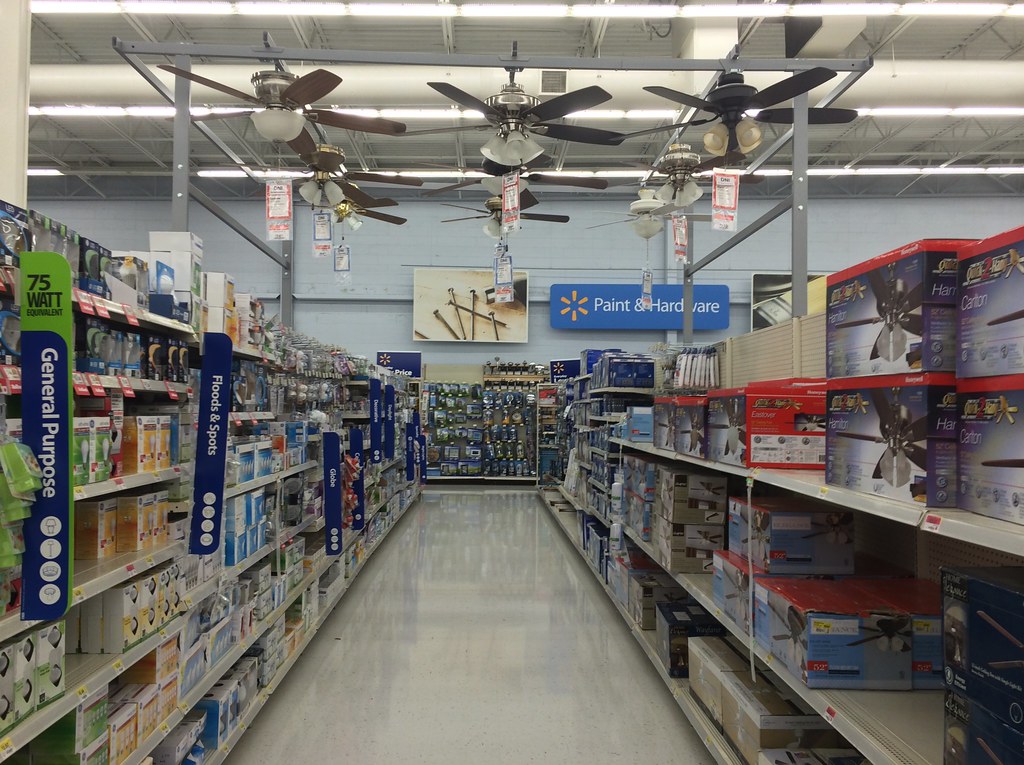 A row of ceiling fans in a store.