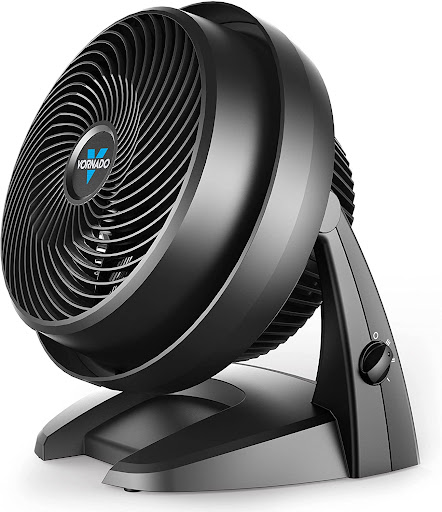 A black fan on top of a stand.