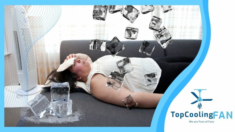A woman laying on a couch with ice cubes falling on her.